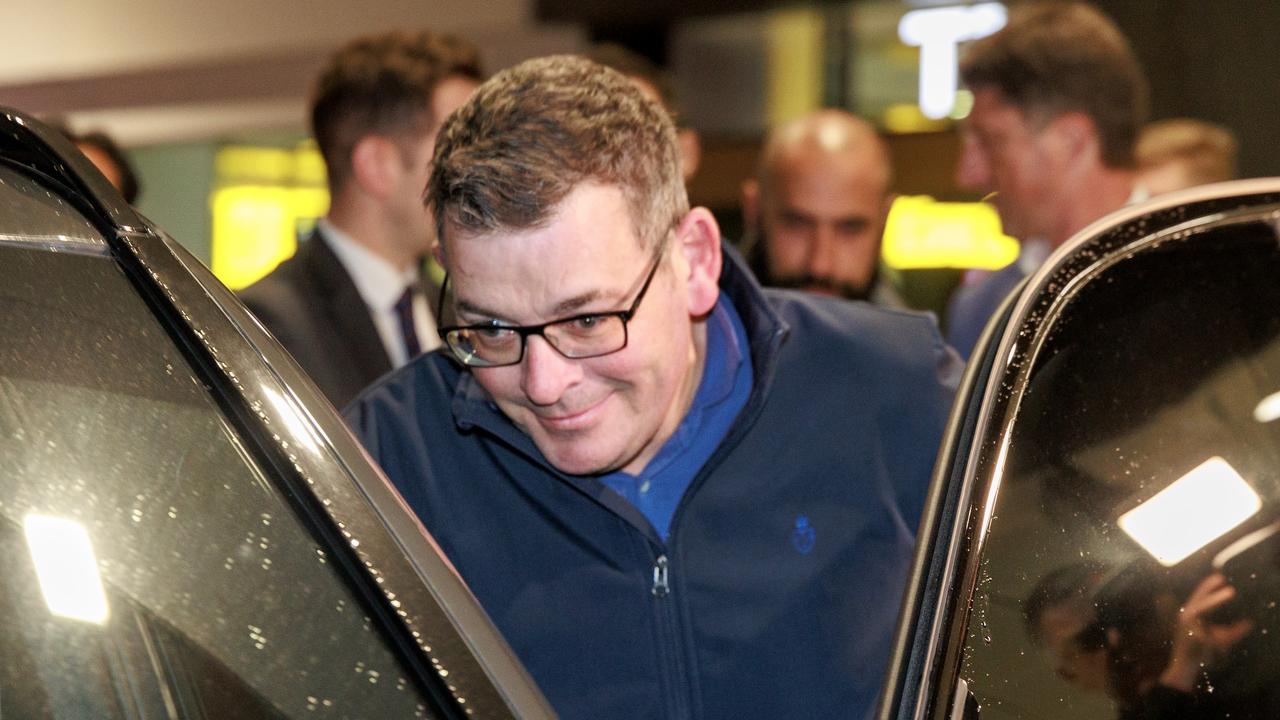 Premier Daniel Andrews arrives at Melbourne airport after returning from a visit to China. Picture: David Geraghty